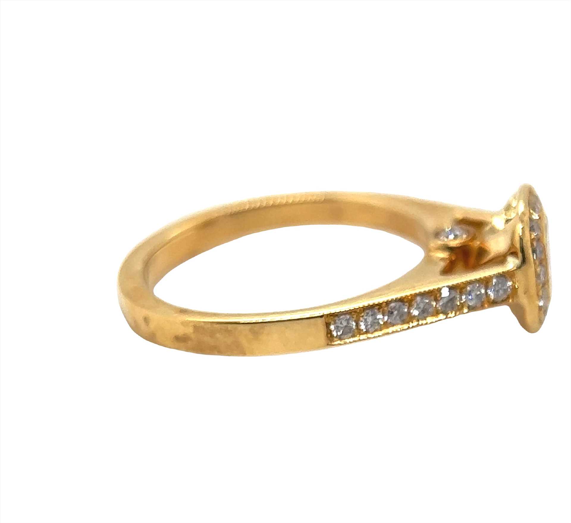 טבעת אירוסין משובצת יהלומים טבעיים סה"כ 0.80 קראט בעיצוב זהב צהוב 18K