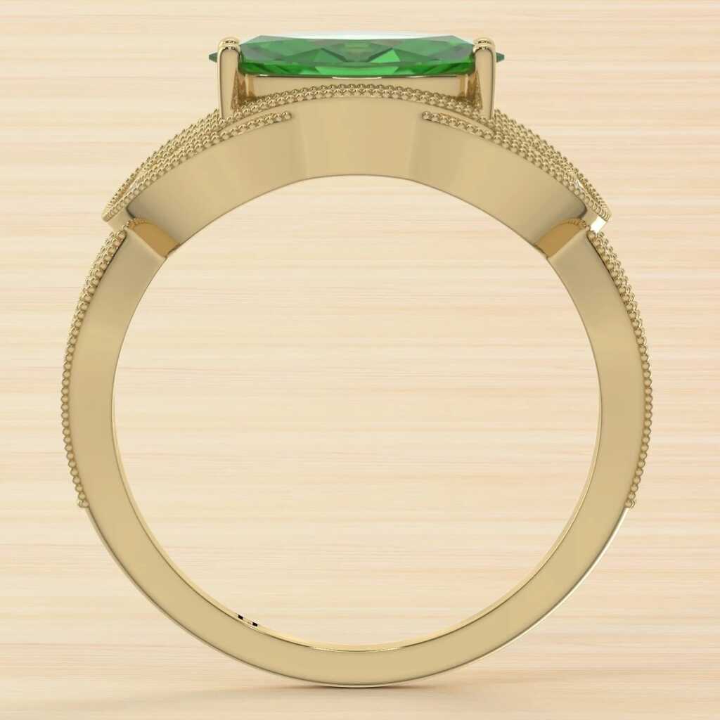 טבעת אמרלד ויהלומים סה"כ 1.65 קראט בעיצוב זהב לבן 14K